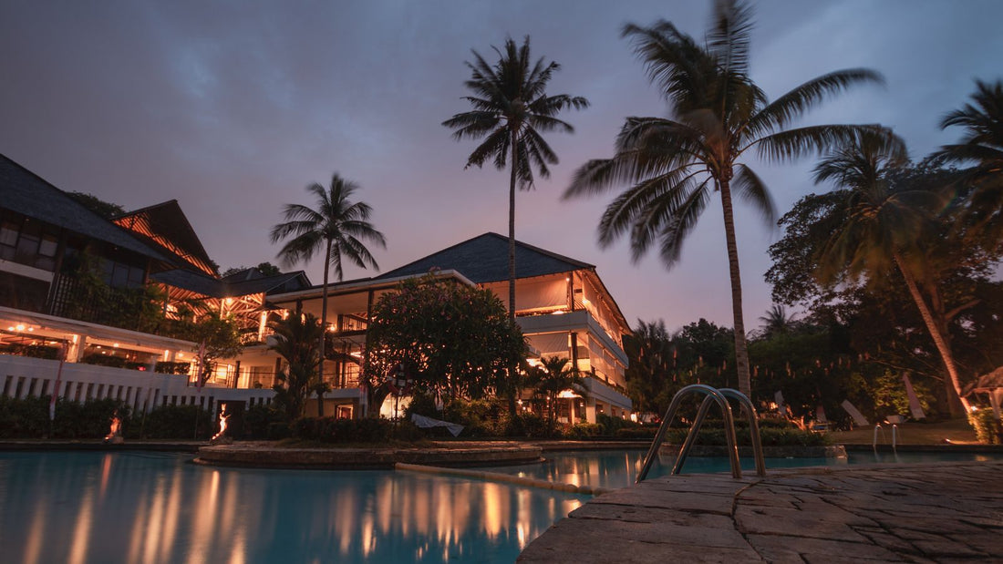 Bright residential swimming pool beside a modern home